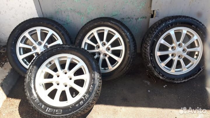 Диски на mitsubishi lancer на шипованный резине