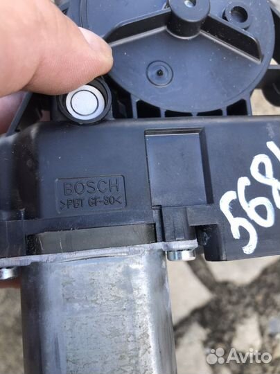 Мотор стеклоподъемника правый перед sorento xm