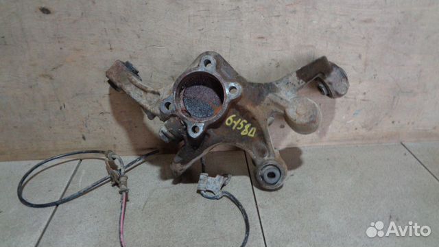 Кулак поворотный задний левый Mitsubishi Galant 9