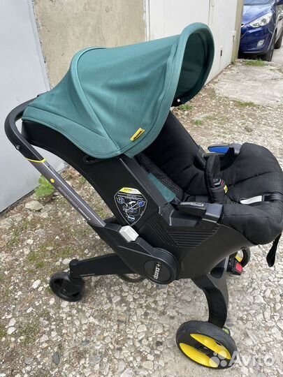 Коляска автокресло doona с базой isofix