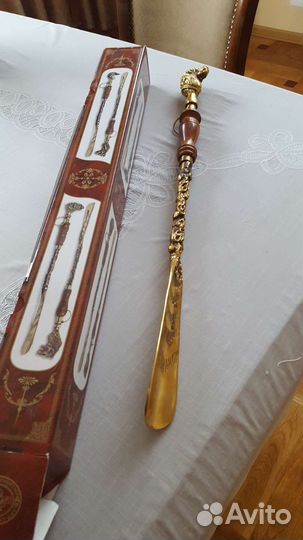 Ложка для обуви бронза