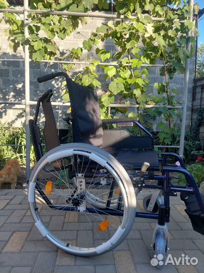 Инвалидная коляска