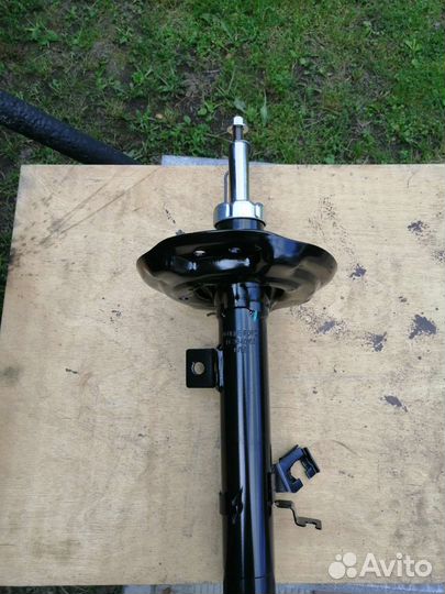 Стойка амортизатора Nissan X-Trail T32