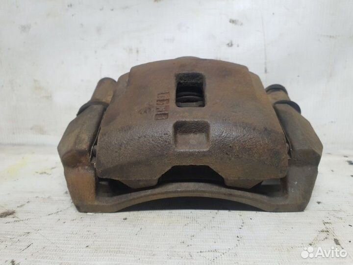 Суппорт передний правый Mazda 626 седан 1997