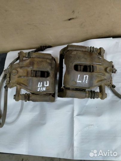 Тормозной суппорт передний ниссан нота е11