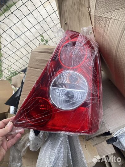 Фонарь задний правый чери фора