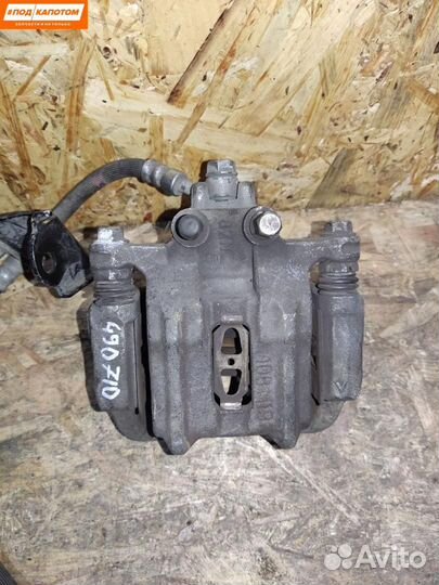 Суппорт тормозной задний левый Honda Accord 8