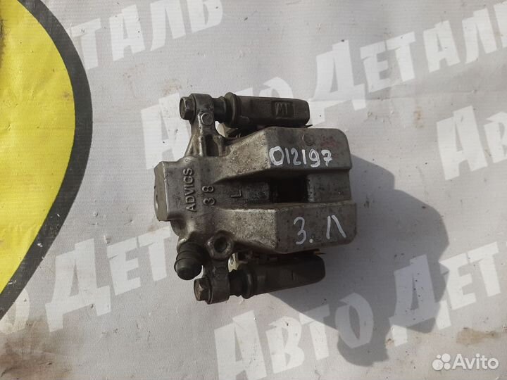 Тормозной суппорт задний левый Toyota Camry XV50