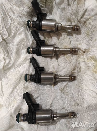 Форсунка топливная Tiguan 2.0, 06h906036p