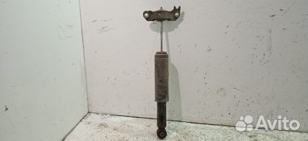 Амортизатор задний левый