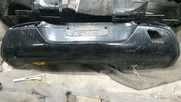 Нижняя юбка заднего бампера опель астра Джей гтс