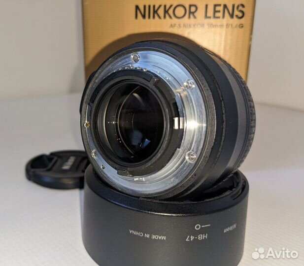 Объектив Nikon 50mm и рюкзак-слинг и чехол