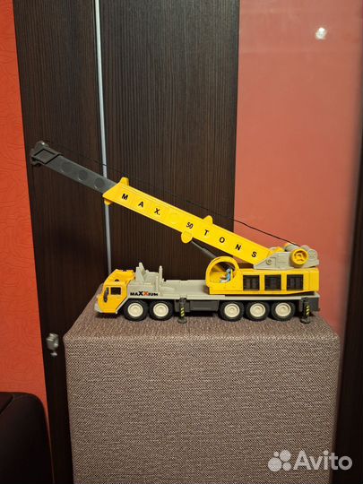 Машина кран