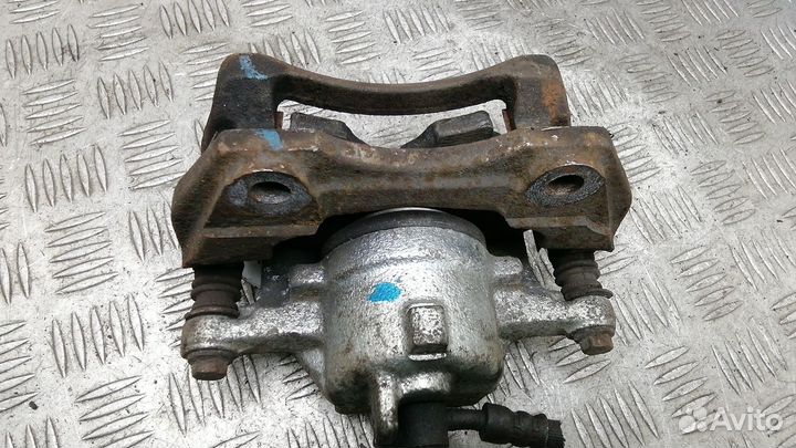 Суппорт передний левый Nissan Almera N16 рест