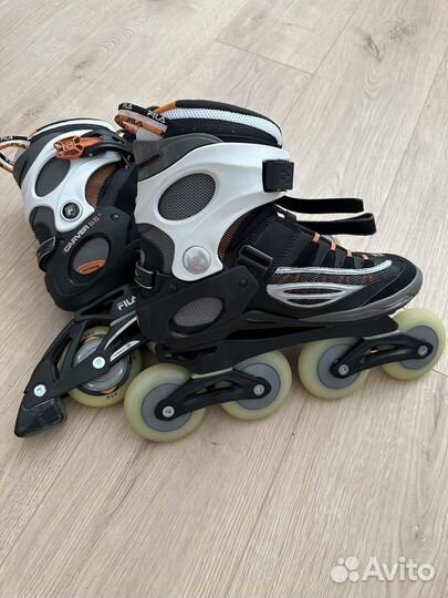Роликовые коньки