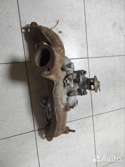 Коллектор выпускной 402 двигателя,новый