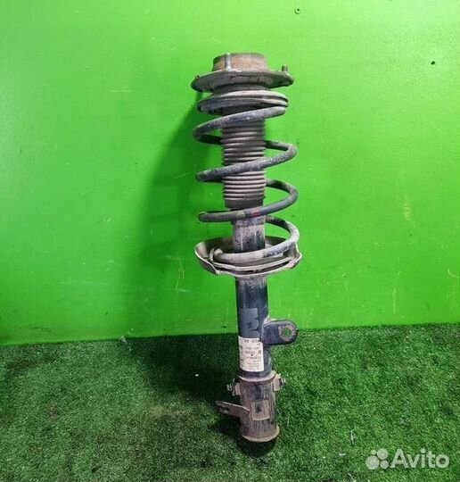 Стойка амортизатора передняя правая KIA Sportage