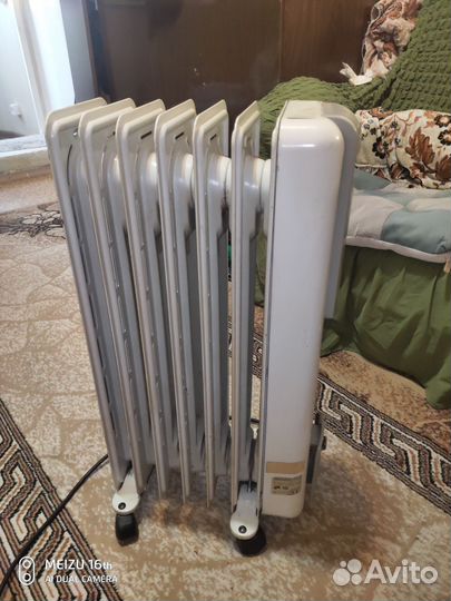 Масляный обогреватель delonghi