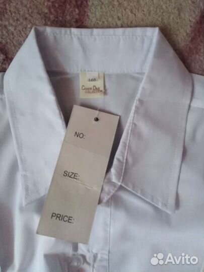 Продам новую, белую рубашку на мальчика