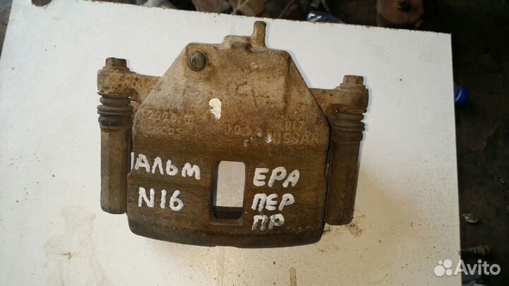 Суппорт передний правый nissan almera N16