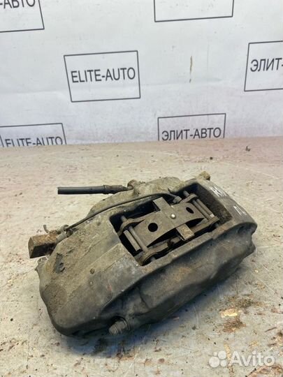 Суппорт тормозной передний левый Lr Range Rover