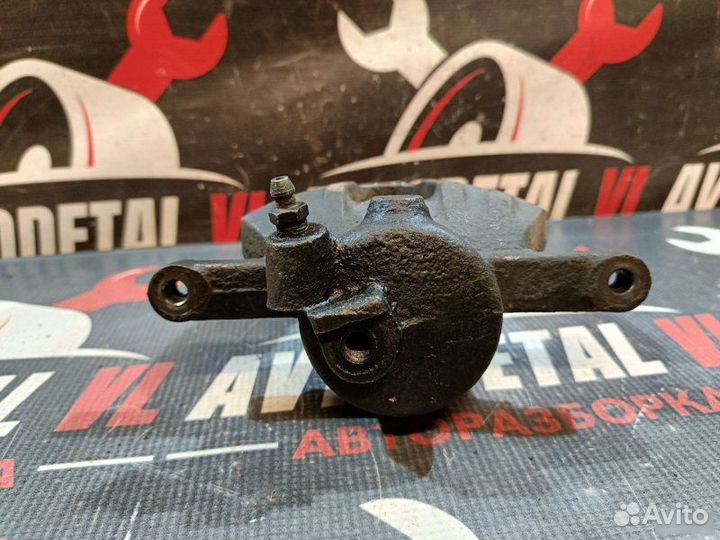 Суппорт тормозной передний Volkswagen Polo