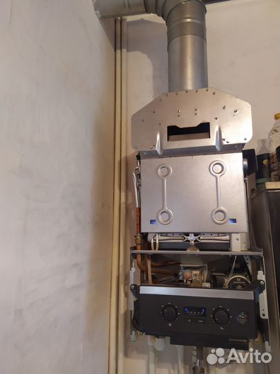 Газовый котел двухконтурный Buderus 044