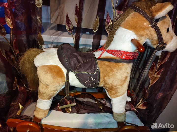 Лошадка качалка со звуковыми эффектами на колесах