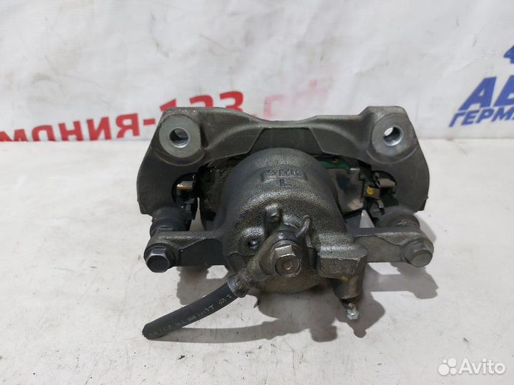 Суппорт тормозной передний левый Toyota Corolla