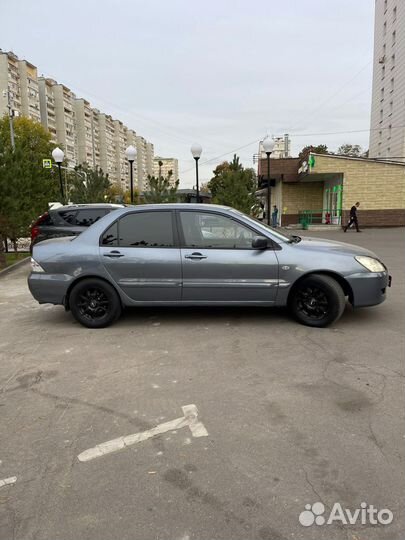 Mitsubishi Lancer 1.6 AT, 2006, 170 000 км