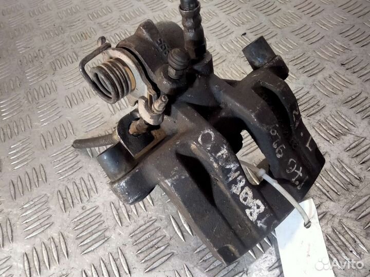 Суппорт задний левый Ford Tourneo Connect