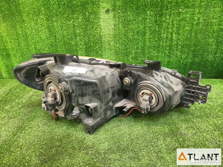 Фара передняя левая mitsubishi airtrek