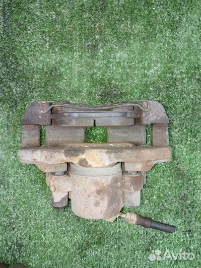 Суппорт тормозной передний левый Ford Fusion