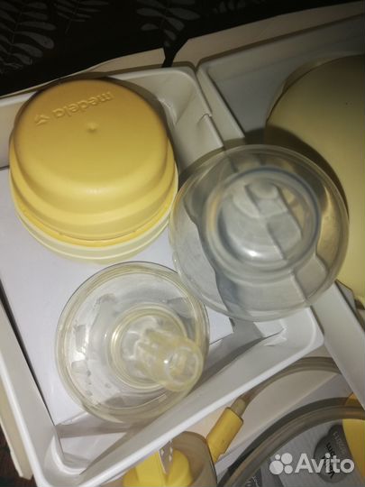 Молокоотсос medela электрический
