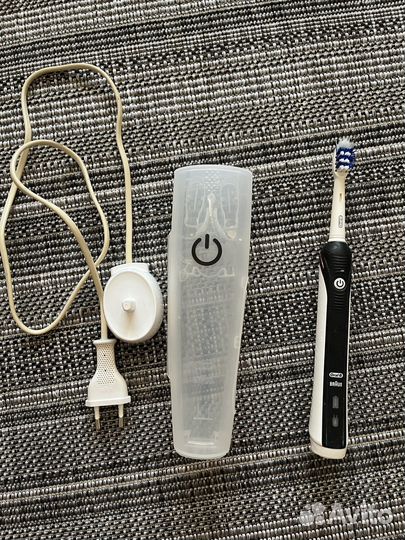 Электрическая зубная щетка braun oral b