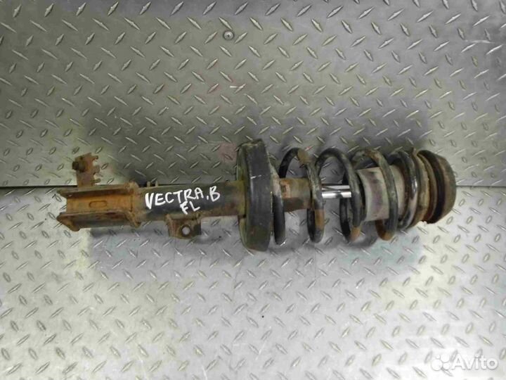 Стойка амортизатора переднего левого Opel Vectra