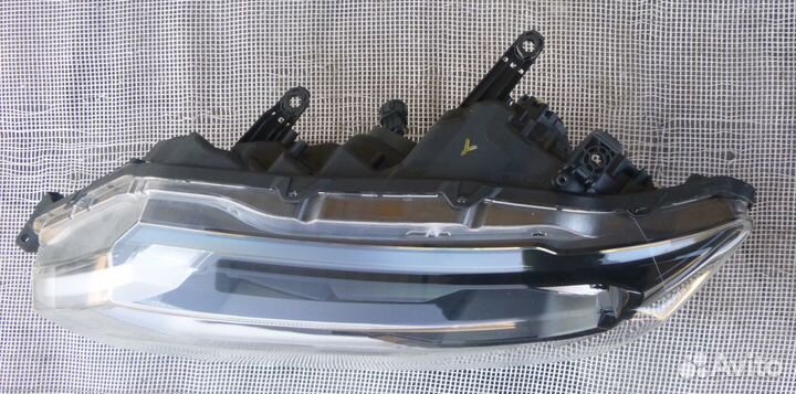 Ниссан Х-трэйл фара передняя