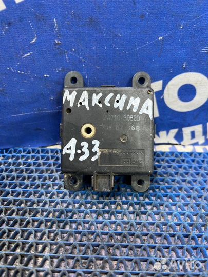 Моторчик заслонок отопителя Nissan Maxima A33