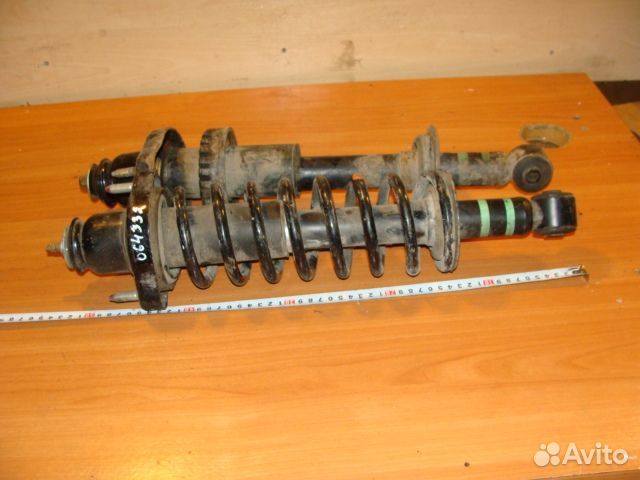 Передний амортизатор Mitsubishi Outlander 06г