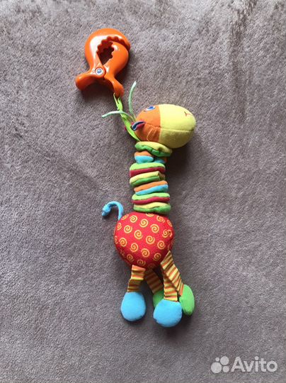 Игрушка на коляску