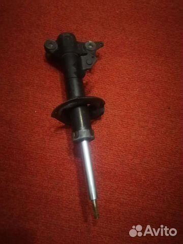 Стойка передняя на nisan Primera 12