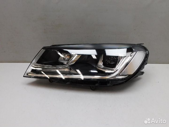 Фара левая Volkswagen Touareg