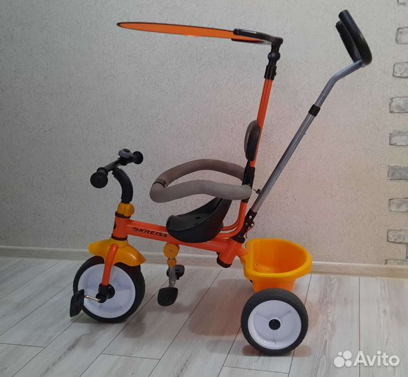 Трехколесный велосипед с ручкой