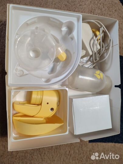 Молокоотсос medela