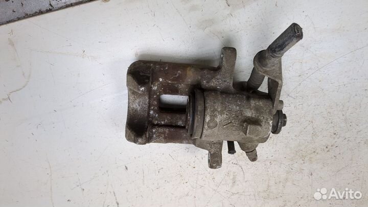 Суппорт левый задний Skoda Rapid