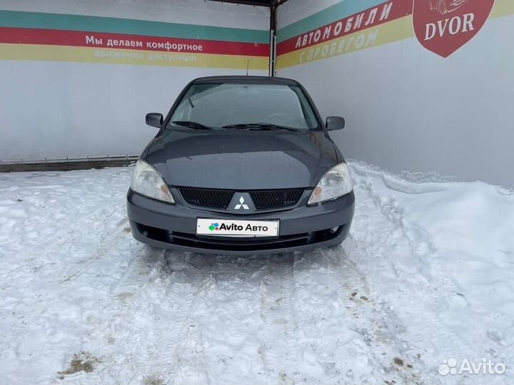 Mitsubishi Lancer 1.6 МТ, 2006, 303 000 км