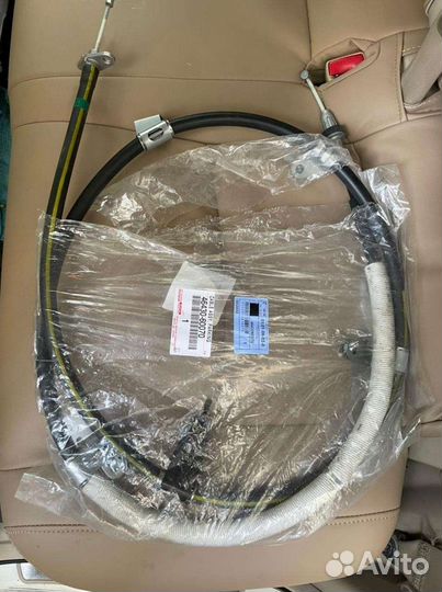 Трос стояночного тормоза