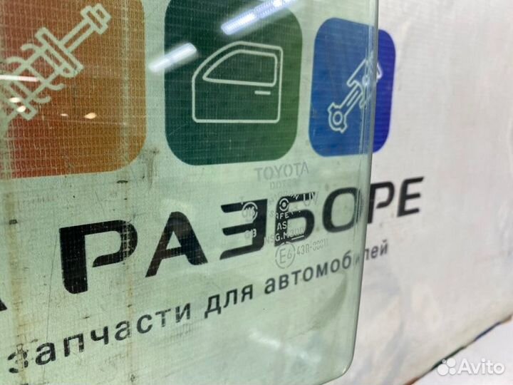 Стекло двери заднее левое Toyota Corolla 150
