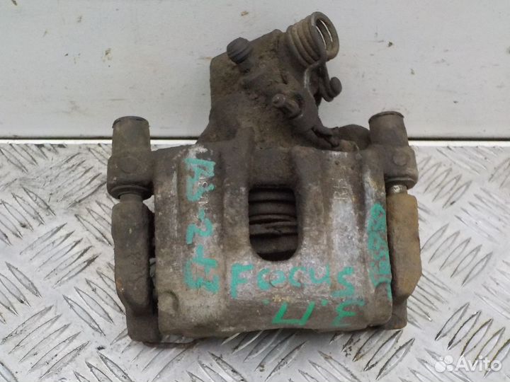 Суппорт тормозной задний правый Ford Focus III 201