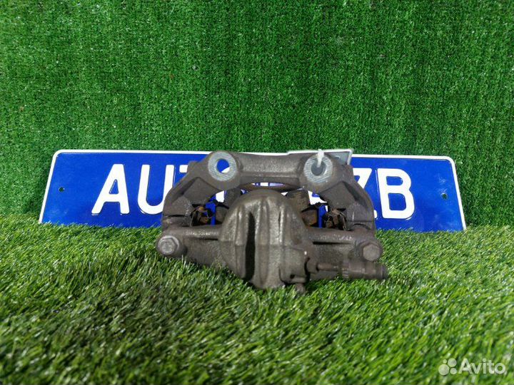 Суппорт тормозной передний левый Peugeot 207